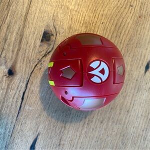 Red and Gold Action‎ Ball by [Brand]